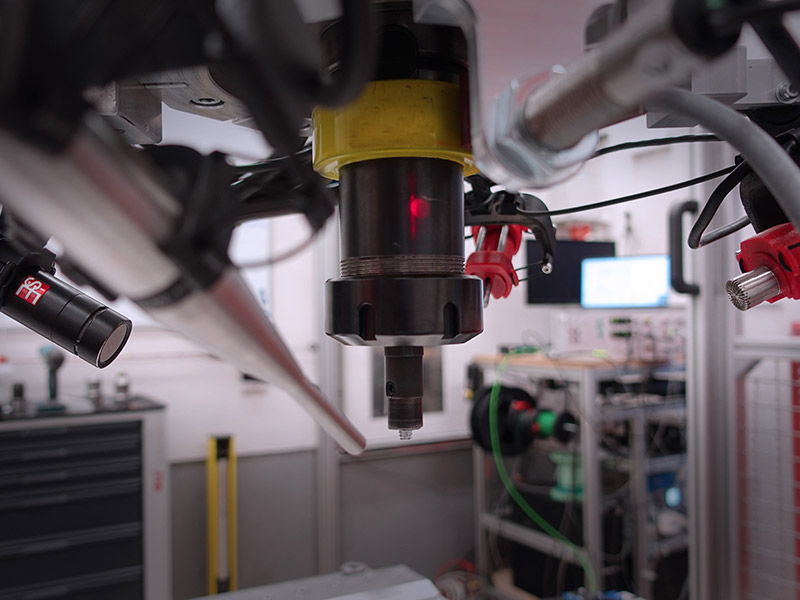 Koeasetelma: Akustinen valvonta pultinhitsauksessa